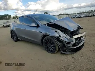 2024 Tesla Model Y Performance with VIN 7SAYGDEF2RF113873, listed as a Copart auction lot 46181915 with 19,625 mi miles and Salvage Title. Bid and sale history available at DreamBid. Image 12.