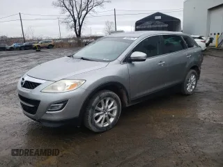 2012 Mazda CX-9 Grand Touring z VIN JM3TB3DA7C0357313, wystawiony jako Copart lot #50888275 z przebiegiem 199 413 mil mil oraz Szkoda całkowita • Salvage title. Historia ofert i sprzedaży dostępna na DreamBid. Obrazek 1.