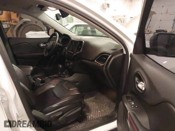 2019 Jeep Cherokee Trailhawk with VIN 1C4PJMBX4KD390061, listed as a IAAI auction lot 42007112 with 72,227 mi miles and . Bid and sale history available at DreamBid. Image 5.
