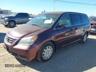 2008 Honda Odyssey LX with VIN 5FNRL382X8B038788, listed as a IAAI auction lot 41816070 with 122,687 mi miles. Bid and sale history available at carsss.com. Image 2.