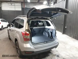 2015 Subaru Forester 2.5i Touring with VIN JF2SJAUC8FH468456, listed as a IAAI auction lot 41132284 with 188,408 mi miles. Bid and sale history available at carsss.com. Image 3.
