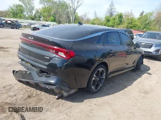 2023 Kia K5 GT-Line z VIN 5XXG64J22PG186976, wystawiony jako IAAI lot #42241886 z przebiegiem 39 502 mil mil oraz . Historia ofert i sprzedaży dostępna na DreamBid. Obrazek 4.