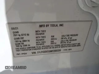 2021 Tesla Model Y Long Range with VIN 5YJYGDEE0MF265339, listed as a IAAI auction lot 41975058 with 51,292 mi miles and . Bid and sale history available at DreamBid. Image 9.