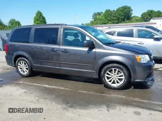 2015 Dodge Grand Caravan SXT with VIN 2C4RDGCG4FR631362, listed as a IAAI auction lot 42027066 with 149,599 mi miles and . Bid and sale history available at DreamBid. Image 13.