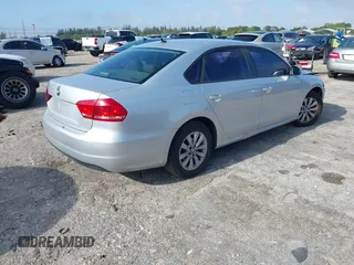 2013 Volkswagen Passat Wolfsburg Edition with VIN 1VWAP7A31DC065040, listed as a IAAI auction lot 42007311 with 133,510 mi miles. Bid and sale history available at carsss.com. Image 4.