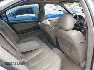 2000 Nissan Maxima GXE z VIN JN1CA31A4YT206065, wystawiony jako IAAI lot #41952514 z przebiegiem 2 953 347 mil mil oraz . Historia ofert i sprzedaży dostępna na DreamBid. Obrazek 8.