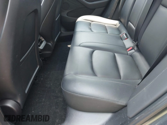 2023 Tesla Model 3 with VIN 5YJ3E1EA7PF409243, listed as a IAAI auction lot 42305360 with Not provided miles and . Bid and sale history available at DreamBid. Image 8.