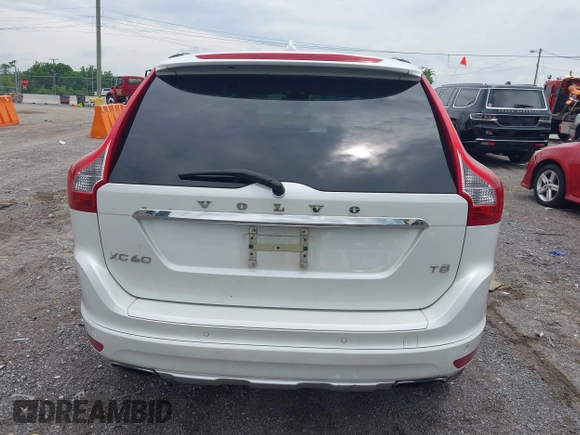 2015 Volvo XC60 T5 Drive-E Premier z VIN YV440MDB9F2622367, wystawiony jako IAAI lot #42356051 z przebiegiem 194 999 mil mil oraz . Historia ofert i sprzedaży dostępna na DreamBid. Obrazek 16.