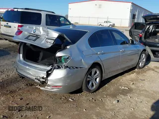 2018 BMW 3 Series 330i with VIN WBA8B9G58JNU97318, listed as a IAAI auction lot 41205434 with 62,582 mi miles and . Bid and sale history available at DreamBid. Image 4.