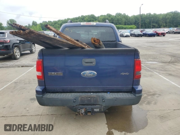 2007 Ford Explorer Sport Trac XLT with VIN 1FMEU51K27UA64546, listed as a Copart auction lot 59719865 with 183,192 mi miles and Salvage title. Bid and sale history available at DreamBid. Image 6.