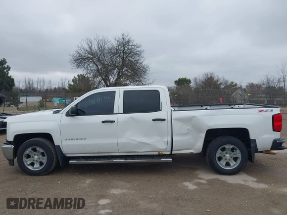 2014 Chevrolet Silverado 1500 LT with VIN 3GCUKREC6EG194197, listed as a IAAI auction lot 41999718 with 206,916 mi miles and . Bid and sale history available at DreamBid. Image 15.