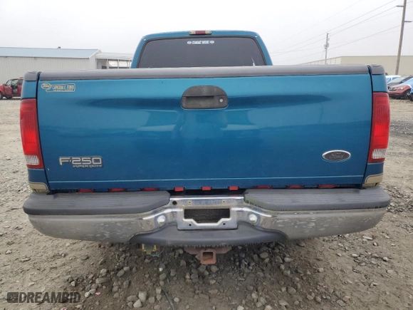 2000 Ford Super Duty F-250 XL with VIN 1FTNX20F0YED29748, listed as a Copart auction lot 75099074 with 0 mi miles and Salvage Title. Bid and sale history available at carsss.com. Image 6.