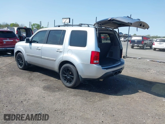 2013 Honda Pilot Touring with VIN 5FNYF3H95DB032438, listed as a IAAI auction lot 41865938 with 298,973 mi miles and . Bid and sale history available at DreamBid. Image 3.