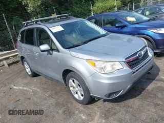 2014 Subaru Forester Premium with VIN JF2SJAGC0EH473208, listed as a IAAI auction lot 42800673 with 186,698 mi miles and . Bid and sale history available at DreamBid. Image 1.