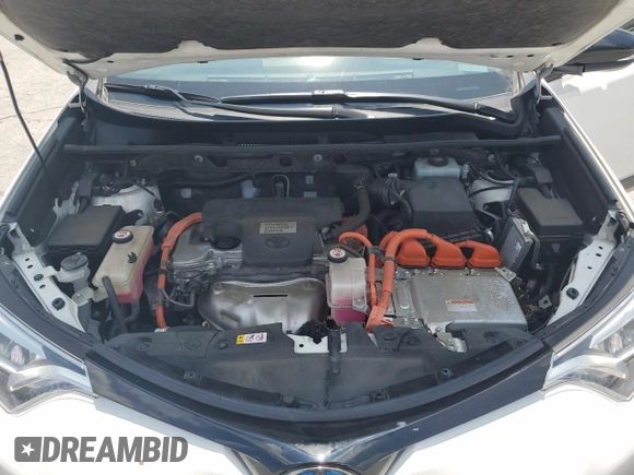 2018 Toyota RAV4 Hybrid SE with VIN JTMJJREVXJD212926, listed as a Copart auction lot 60215465 with 71,876 mi miles and Salvage title. Bid and sale history available at DreamBid. Image 12.