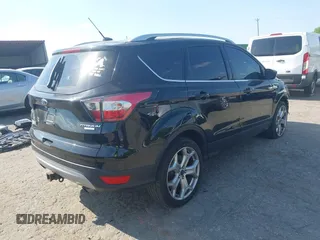 2017 Ford Escape Titanium with VIN 1FMCU0J91HUA75417, listed as a IAAI auction lot 42044170 with 116,431 mi miles. Bid and sale history available at carsss.com. Image 4.