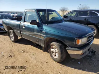 1997 Mazda B-Series 2WD Truck with VIN 4F4CR12A1VTM15033, listed as a Copart auction lot 84459434 with 143,764 mi miles and Salvage Title. Bid and sale history available at carsss.com. Image 4.