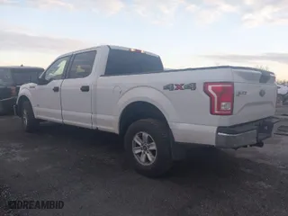 2015 Ford F-150 XLT w/HD Payload Pkg with VIN 1FTFW1EG3FFC39052, listed as a IAAI auction lot 41046847 with 151,061 mi miles. Bid and sale history available at carsss.com. Image 3.