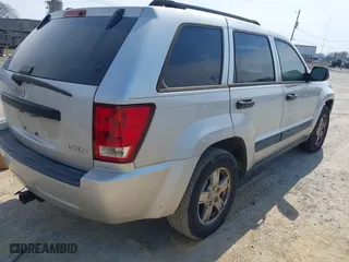 2005 Jeep Grand Cherokee Laredo with VIN 1J4GS48K45C633414, listed as a IAAI auction lot 41797842 with 311,852 mi miles. Bid and sale history available at carsss.com. Image 4.