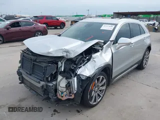 2019 Cadillac XT4 FWD Premium Luxury z VIN 1GYFZCR42KF189610, wystawiony jako IAAI lot #42137690 z przebiegiem 92 502 mil mil oraz . Historia ofert i sprzedaży dostępna na DreamBid. Obrazek 19.
