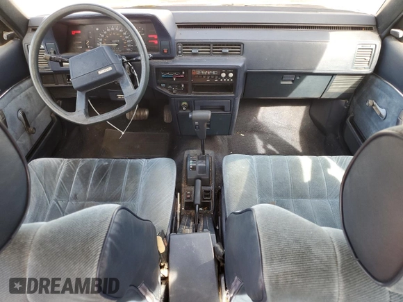 1986 Toyota Camry z VIN JT2SV12E3G6021210, wystawiony jako Copart lot #49623985 z przebiegiem 144 064 mil mil oraz Czysty tytuł • Clean title. Historia ofert i sprzedaży dostępna na DreamBid. Obrazek 8.