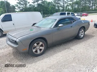 2011 Dodge Challenger z VIN 2B3CJ4DG9BH570295, wystawiony jako IAAI lot #42288192 z przebiegiem 162 094 mil mil oraz . Historia ofert i sprzedaży dostępna na DreamBid. Obrazek 2.