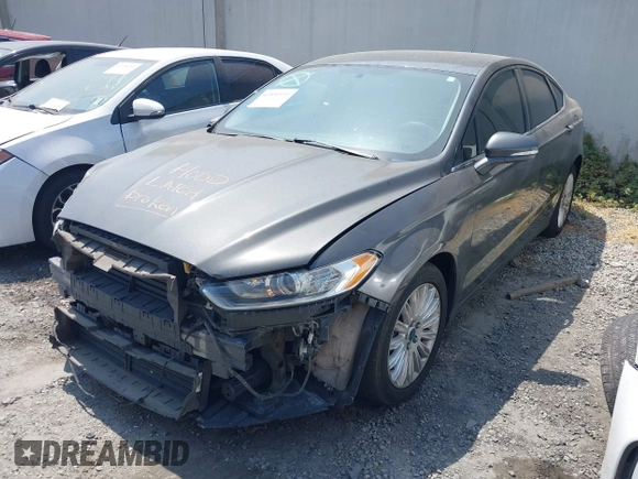 2016 Ford Fusion SE Hybrid z VIN 3FA6P0LU0GR218685, wystawiony jako IAAI lot #42550930 z przebiegiem 178 041 mil mil oraz . Historia ofert i sprzedaży dostępna na DreamBid. Obrazek 2.