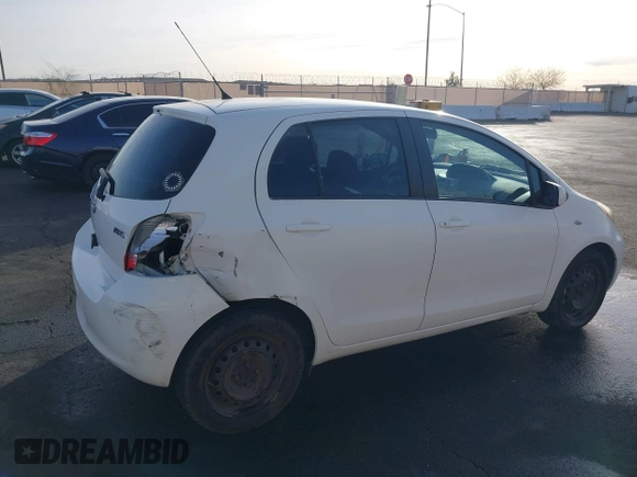2009 Toyota Yaris with VIN JTDKT903795263620, listed as a IAAI auction lot 41100398 with 66,384 mi miles. Bid and sale history available at carsss.com. Image 14.