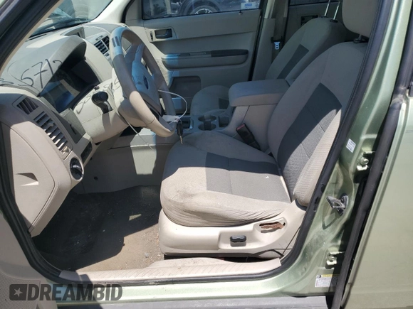 2008 Ford Escape XLT with VIN 1FMCU03158KC24575, listed as a Copart auction lot 57133855 with 200,329 mi miles and Salvage title. Bid and sale history available at DreamBid. Image 7.