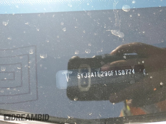 2016 Tesla Model S 90D z VIN 5YJSA1E29GF158774, wystawiony jako Copart lot #60143405 z przebiegiem Nie podano mil oraz Szkoda całkowita • Salvage title. Historia ofert i sprzedaży dostępna na DreamBid. Obrazek 12.