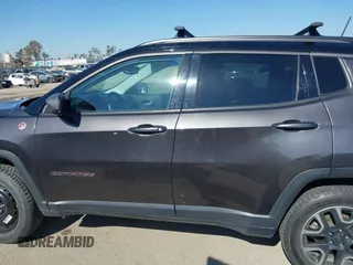 2019 Jeep Compass Trailhawk with VIN 3C4NJDDB3KT759849, listed as a IAAI auction lot 42141467 with 100,915 mi miles and . Bid and sale history available at DreamBid. Image 14.