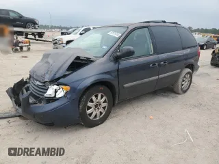 2007 Chrysler Town & Country SWB with VIN 1A4GJ45RX7B173625, listed as a Copart auction lot 87371914 with 106,826 mi miles and Salvage Title. Bid and sale history available at carsss.com. Image 1.