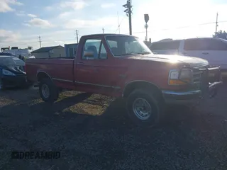 1996 Ford F-150 with VIN 1FTEF14H7TLB56002, listed as a IAAI auction lot 41403997 with 216,886 mi miles. Bid and sale history available at carsss.com. Image 1.