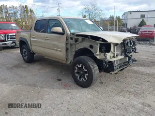2016 Toyota Tacoma SR with VIN 3TMCZ5AN3GM014024, listed as a IAAI auction lot 41234589 with 140,632 mi miles and . Bid and sale history available at DreamBid. Image 1.