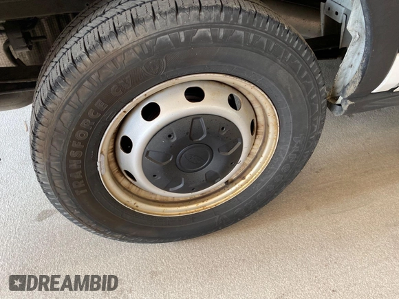 2019 Ford Transit with VIN 1FTYE1YM0KKB31938, listed as a IAAI auction lot 42667322 with 196,239 mi miles and . Bid and sale history available at DreamBid. Image 4.