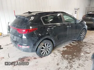 2019 Kia Sportage EX with VIN KNDPNCAC0K7606712, listed as a IAAI auction lot 41652131 with 71,013 mi miles. Bid and sale history available at carsss.com. Image 4.