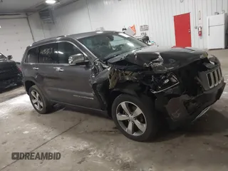 2016 Jeep Grand Cherokee Limited 75th Anniversary with VIN 1C4RJFBG3GC311089, listed as a IAAI auction lot 41953517 with 127,720 mi miles and . Bid and sale history available at DreamBid. Image 1.