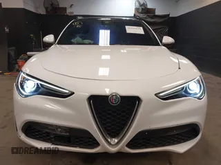 2020 Alfa Romeo Stelvio Ti z VIN ZASPAKBN9L7C92041, wystawiony jako IAAI lot #41329129 z przebiegiem 47 977 mil mil oraz . Historia ofert i sprzedaży dostępna na DreamBid. Obrazek 12.