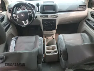 2014 Volkswagen Routan SE z VIN 2C4RVABG0ER134352, wystawiony jako Copart lot #58467235 z przebiegiem 161 822 mil mil oraz Czysty tytuł • Clean title. Historia ofert i sprzedaży dostępna na DreamBid. Obrazek 8.