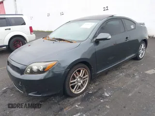 2010 Scion tC with VIN JTKDE3B75A0314185, listed as a IAAI auction lot 41369224 with 164,244 mi miles. Bid and sale history available at carsss.com. Image 2.