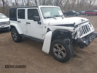 2017 Jeep Wrangler Unlimited 75th Anniversary z VIN 1C4BJWEG9HL684152, wystawiony jako IAAI lot #41880074 z przebiegiem 91 847 mil mil oraz . Historia ofert i sprzedaży dostępna na DreamBid. Obrazek 1.