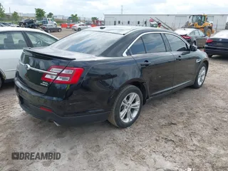 2016 Ford Taurus SEL z VIN 1FAHP2E82GG156346, wystawiony jako IAAI lot #42468616 z przebiegiem 159 425 mil mil oraz . Historia ofert i sprzedaży dostępna na DreamBid. Obrazek 4.
