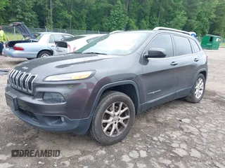 2016 Jeep Cherokee Altitude with VIN 1C4PJMCB6GW117878, listed as a IAAI auction lot 42418402 with 139,665 mi miles and . Bid and sale history available at DreamBid. Image 2.