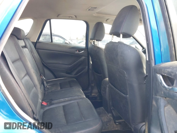 2014 Mazda CX-5 Grand Touring with VIN JM3KE4DY1E0327703, listed as a IAAI auction lot 41755735 with 206,845 mi miles. Bid and sale history available at carsss.com. Image 8.