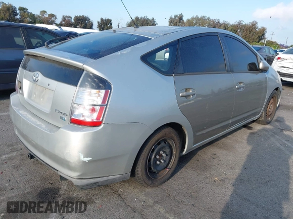 2005 Toyota Prius z VIN JTDKB20U353071619, wystawiony jako IAAI lot #42386134 z przebiegiem Nie podano mil oraz . Historia ofert i sprzedaży dostępna na DreamBid. Obrazek 4.