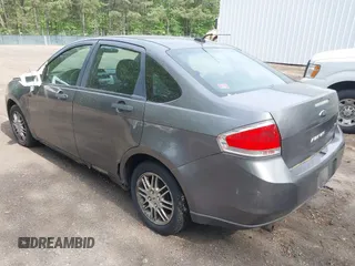 2010 Ford Focus SE with VIN 1FAHP3FNXAW125238, listed as a IAAI auction lot 42109371 with 179,761 mi miles. Bid and sale history available at carsss.com. Image 3.