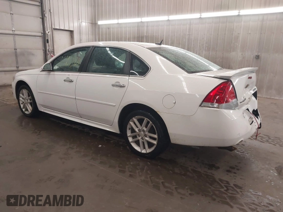 2012 Chevrolet Impala LTZ with VIN 2G1WC5E33C1331027, listed as a IAAI auction lot 42170924 with 211,065 mi miles and . Bid and sale history available at DreamBid. Image 3.