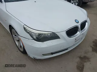 2009 BMW 5 Series 528i with VIN WBANU53529C121927, listed as a IAAI auction lot 42063066 with 195,322 mi miles and . Bid and sale history available at carsss.com. Image 6.