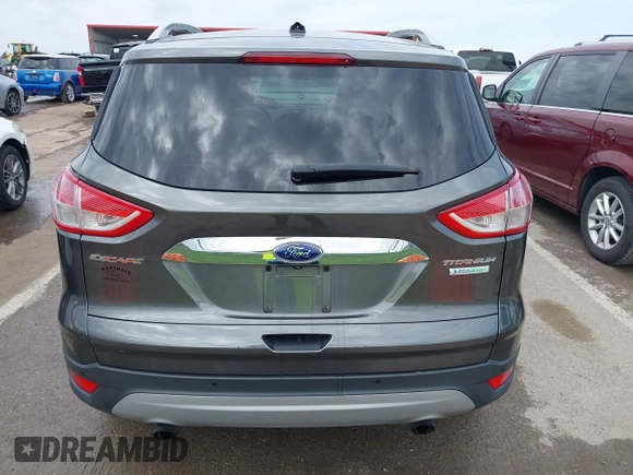 2015 Ford Escape Titanium with VIN 1FMCU0J90FUA25086, listed as a IAAI auction lot 41993681 with 126,170 mi miles. Bid and sale history available at carsss.com. Image 16.