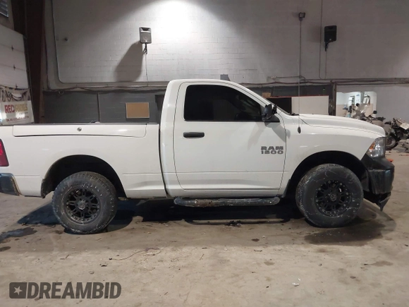 2014 Ram 1500 Express with VIN 3C6JR6AG7EG310097, listed as a IAAI auction lot 41409343 with 134,140 mi miles and . Bid and sale history available at DreamBid. Image 13.